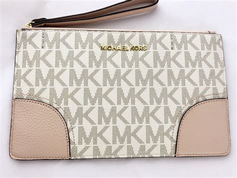 michael kors wristlet wallet pink|Michael Kors wristlet sale.